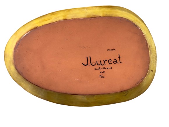 Grand plat à motif de coq et feuillages sur fond jaune 
