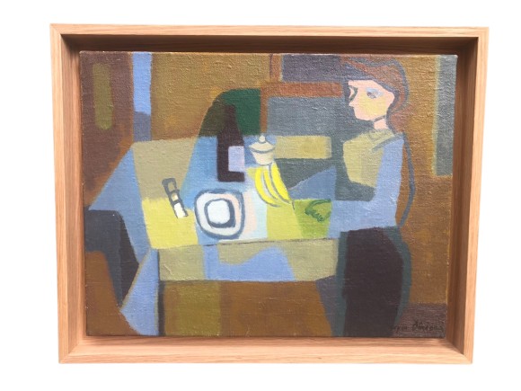 femme attabl&eacute;e 